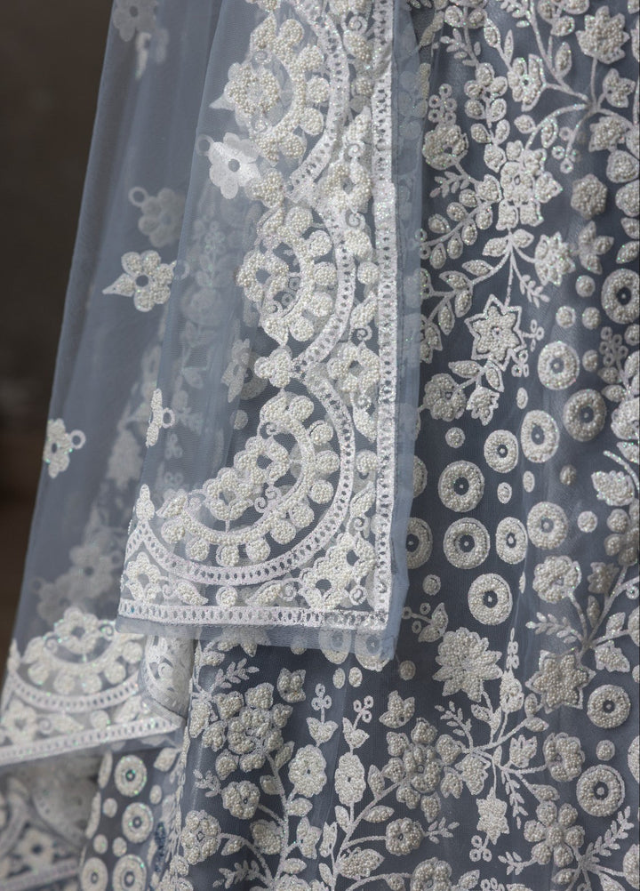 Elaya by House of Nyyra Unstitched 3 Piece Embossed Blue and white shimmery - Festive Collection