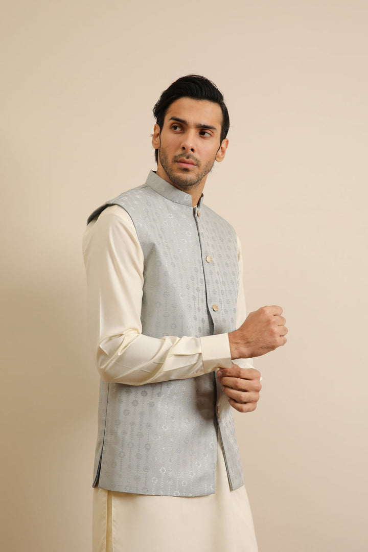Muraqsh Ready To Wear Solids Cotton Men Sky Blue Jamawar Textured Waistcoat MURBJTW - Summer Collection