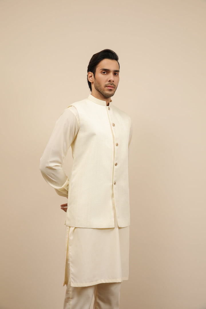 Muraqsh Ready To Wear Solids Bosky Men Bosky White Kurta Trouser with Off White Jamawar Waistcoat MUR-BWKTW - Summer Collection