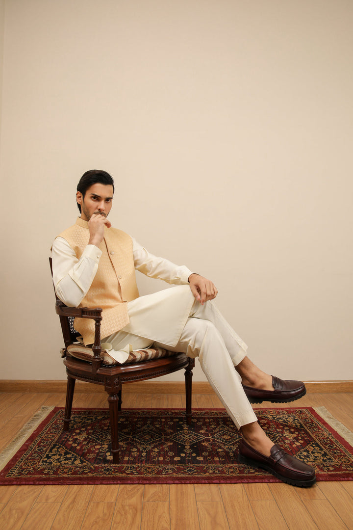 Muraqsh Ready To Wear Solids Bosky Men Bosky White Kurta Trouser with Skin Jamawar Waistcoat MUR-BWKTW - Summer Collection