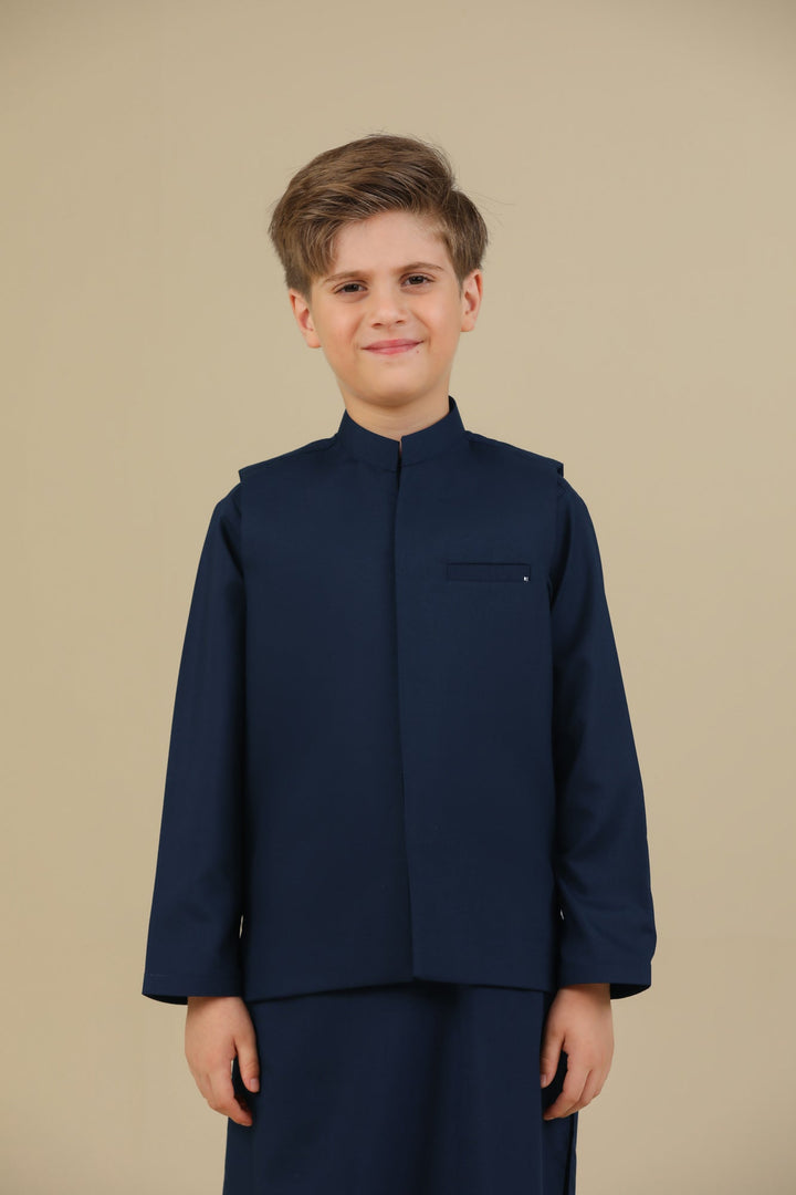 Muraqsh Ready To Wear Solids Cotton Boys Navy Blue Kurta Trouser with Blended Waistcoat MUR-NBKTW - Summer Collection