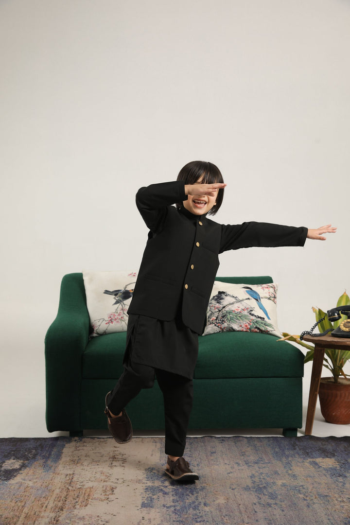Muraqsh Ready To Wear Solids Cotton Boys Black Kurta Trouser with Blended Waistcoat Round Cut Buttoned MUR-BKTWB - Summer Collection
