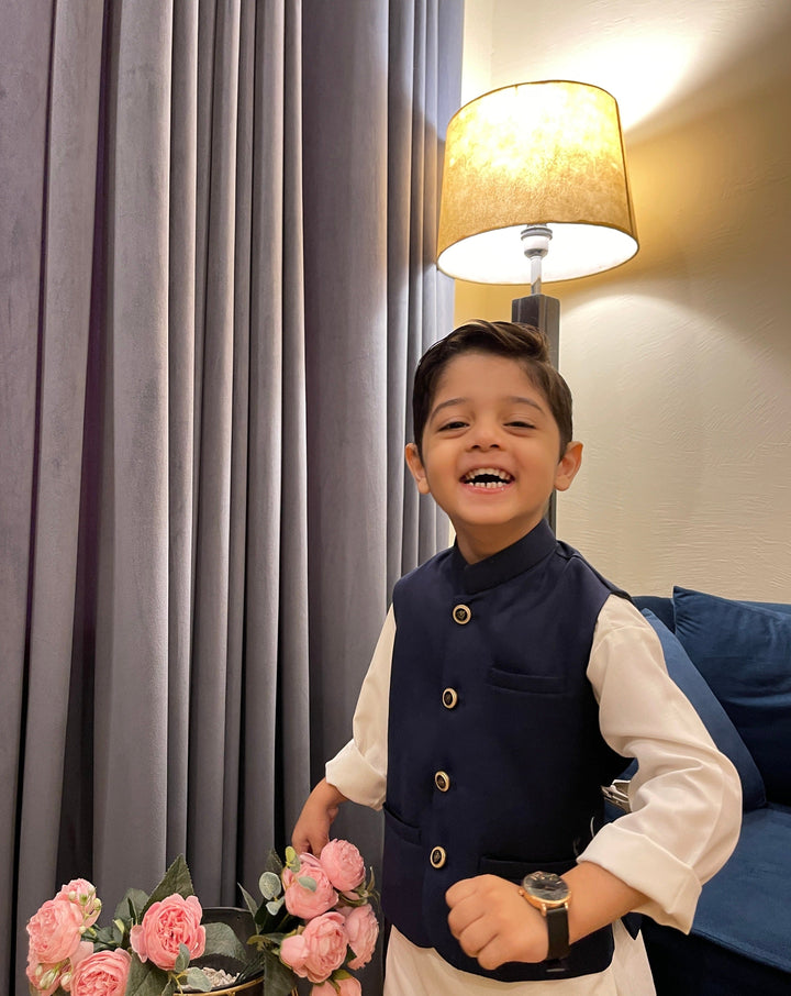 Muraqsh Ready To Wear Solids Cotton Boys Off White Kurta Trouser with Navy Blue Suiting Waistcoat MURP - Summer Collection