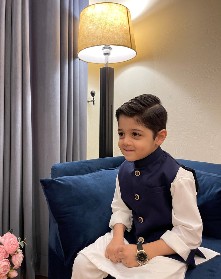 Muraqsh Ready To Wear Solids Cotton Boys Off White Kurta Trouser with Navy Blue Suiting Waistcoat MURP - Summer Collection