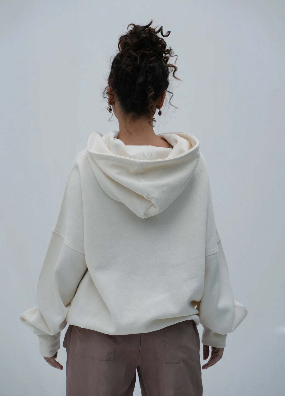 Movement Unisex Western 1 Piece Printed Fleece Tehreek Relaxed Hoodie Off-White - Winter Collection