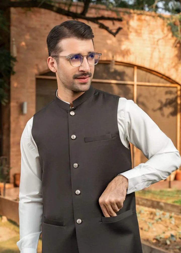 Muraqsh Off White Kameez Shalwar with Brown Suiting Waistcoat Round Cut