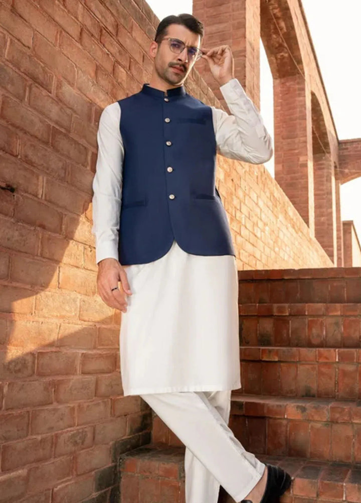 Muraqsh Off White Kameez Shalwar with Navy Blue Suiting Waistcoat Round Cut
