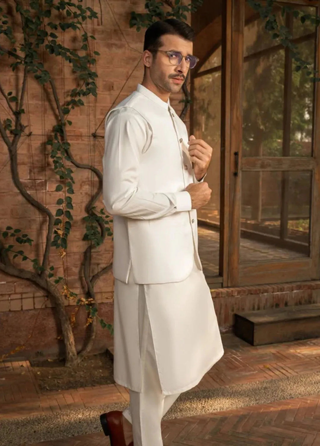 Muraqsh Off White Kameez Shalwar with Suiting Waistcoat Round Cut